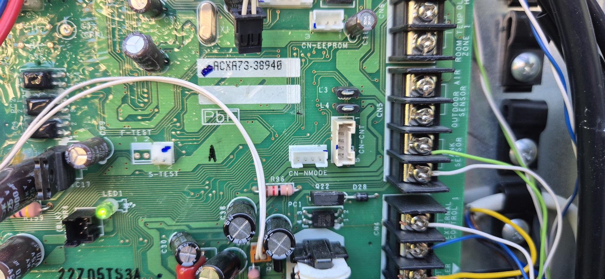 Panasonic Aquarea mainboard showing the CN-CNT and CN-NMODE connectors